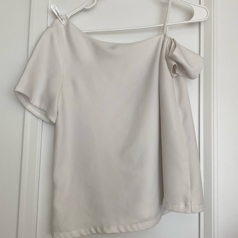 White asymmetric blouse